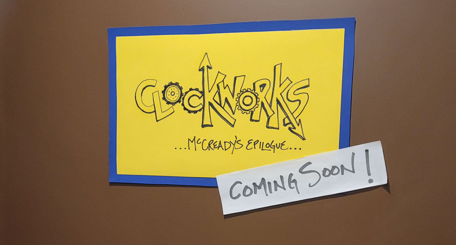 sign that says clockworks - coming soon on closed door